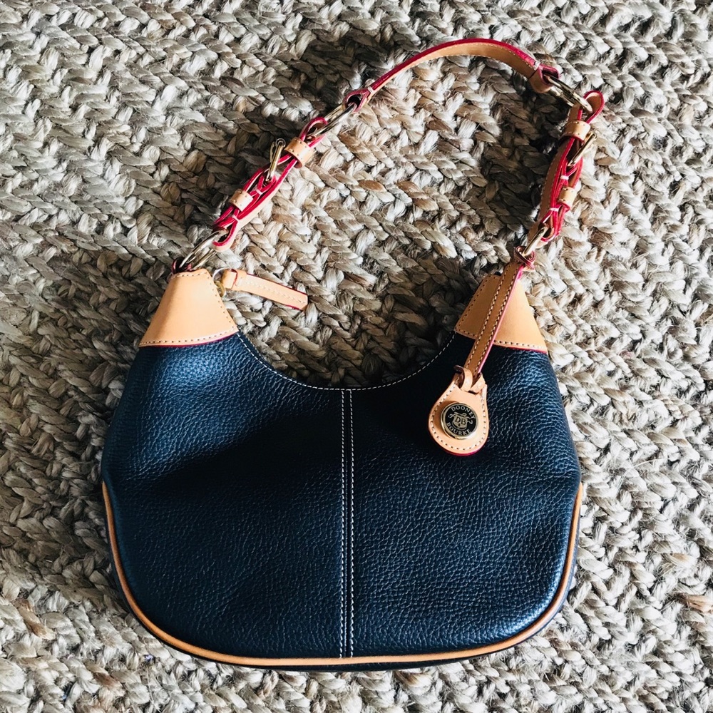 Dooney & Bourke. All weather leather small purse!